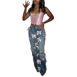 Vaqueros de mujer a la moda con lazo, lavados y rotos, explosión de verano - Product Image 3