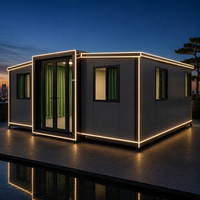 Studio de jardin modulaire extensible préfabriqué respirant et moderne avec bande lumineuse LED, porte double vitrée et toit plat pour l'arrière-cour