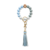 Porte-clés tendance en perles de silicone avec pompon en cuir PU, bracelet portable pour clés de voiture, ornement suspendu