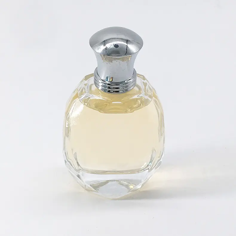 Botella de perfume ovalada de vidrio transparente, vacía, portátil, para viaje, 69ml