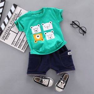 Ventes en gros de t-shirts en coton uni pour enfants, à motifs de dessins animés, et de pantalons à carreaux foncés pour garçons, fabriqués en Chine - Product Image 1