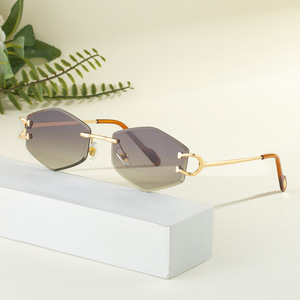 Nuevas gafas de sol sin montura para mujer, patillas metálicas, lentes TAC, protección UV400, ligeras, estilo urbano, gafas de sol de moda. - Product Image 1