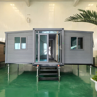 Maison conteneur modulaire portable et mobile de 40 pieds à double aile, résistante aux intempéries, à montage rapide, avec cuisine et salle de bain