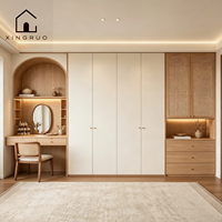 Armoire européenne en mélamine XINGRUO avec portes battantes, coiffeuse intégrée sur mesure pleine hauteur, 4 tiroirs grande capacité pour chambre à coucher