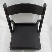 Chaises pliantes en résine noire à forte capacité, avec sièges rembourrés en PU souple, en polypropylène, pour événements hôteliers, vente en gros
