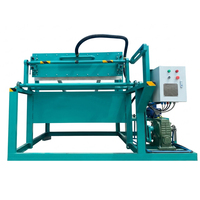 Machine à cartons d'œufs économique et écologique avec système de séchage