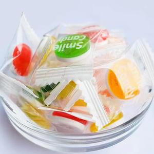 Bonbons durs en tablettes de cristal mélangés, saveur fruitée, motif visage souriant, en sachet rouge, haute valeur esthétique - Product Image 1