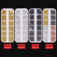 Nouveaux accessoires pour ongles transfrontaliers petites perles en acier dans une boîte longue à 12 grilles ensemble de clous en métal doré et argenté