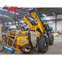 Plateforme de forage hydraulique intégrée à changement automatique de tige de forage, pour forage en fond de trou et dynamitage de goujons rocheux