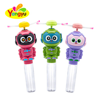 Nouveauté : Boîte de présentation de 12 jouets bonbons en forme de tube robot lumineux à hélice rotative, vente en gros en vrac