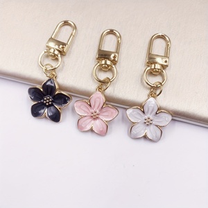 Wholesale Custom 3D Metal <b>Cute</b> Enamel Small Flower Designer Keychain Bag Fashion Pendant Charm - Product Image 1