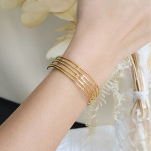 Gold C-Shaped Geometric Line Titanium Steel Bracelet For Women Minimalist Jewelry 18K Plated Fashion Accessory - Product Image 1