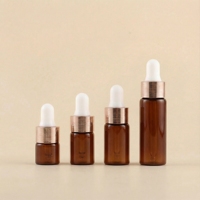 Flacon compte-gouttes de luxe en verre or rose 1ml 2ml 3ml 5ml avec bouchon à vis sérigraphié et capuchon anneau nid d'abeille