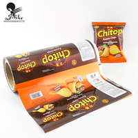 Film laminé PE PET rouleau de film plastique personnalisé bouffée de bonbon alimentaire banane croustilles rouleau de film d'emballage alimentaire pour emballage alimentaire