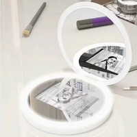 2025New Arrival Miroir de caméra UV intelligent Miroir de maquillage de voyage rechargeable avec lumière pour tester la protection solaire Protection de la peau