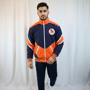 Blouson universitaire homme orange et bleu marine, col montant, fermeture éclair, coupe-vent sportif, design à patchs brodés, color block, Urban Productions - Product Image 1