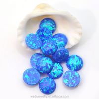 Cabochon rond en opale de feu blanche à dos plat pour bijoux en opale