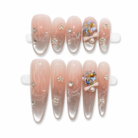 Faux ongles de luxe faits main, grands, avec breloques en zircone irisée, nœuds 3D, paillettes argentées et motif ondulé ovale, à coller sur les doigts
