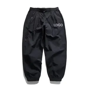 Bán buôn sản xuất Sweatpants Jogger phù hợp với trống Tracksuit mồ hôi Thiết lập tùy chỉnh chắp vá Nylon người đàn ông theo dõi quần