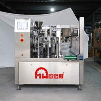 Machine d'emballage automatique rotative préfabriquée de sac sec de noix de fruit Machine d'emballage autoportante de biscuit de chocolat de sac