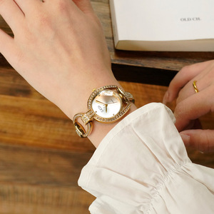 Reloj de pulsera de lujo para mujer con incrustaciones de diamantes en forma de gota, reloj de moda retro para mujer, reloj de cuarzo para mujer para banquetes - Product Image 2