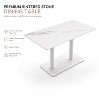 Table de restaurant, plateau en pierre frittée avec base à double colonne blanche et design de table aux coins arrondis pour hôtel et café