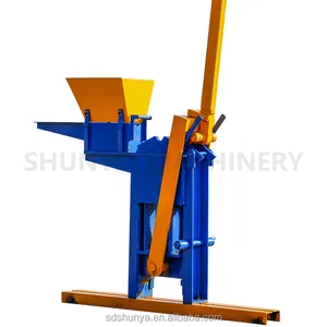 Machine manuelle de fabrication de blocs de terre d'argile en Ouganda pour la fabrication de briques QMR2-40 de petites machines de fabrication de briques d'argile
