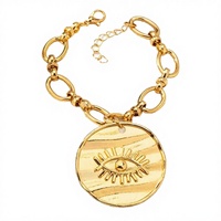 Bracelet chaîne à maillons avec pendentif pièce de monnaie et motif œil humanoïde, style vintage, unique et élégant, pour femme, idéal pour les soirées