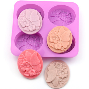 BPA Free 4 fori farfalla ovale torta in Silicone stampo in Silicone per sapone stampo per candela - Product Image 1