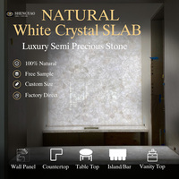 Dalles de pierre translucide en quartz blanc rétroéclairé sur mesure pour projets de comptoirs et murs décoratifs