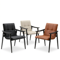 Fauteuil en cuir capitonné moderne
