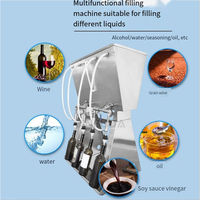 Machine de remplissage par gravité à 4 becs pour vins, spiritueux et jus de fruits dans des bouteilles en verre ou en plastique