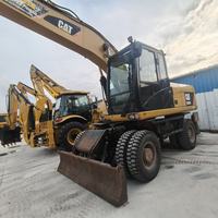 En stock, excavatrice sur pneus d'occasion CAT M320D2 de 19,5 tonnes, excavatrice sur pneus Caterpillar d'occasion à vendre
