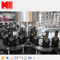 Machine automatique de remplissage et de capsulage de bouteilles en verre Trun-key pour eau vin whisky vodka liqueur