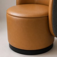 Fauteuil de salon moderne en cuir avec accoudoirs, idéal pour les hôtels, salles d'attente et chambres.