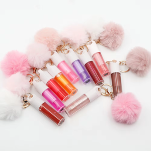 Aceite labial en tubo redondo tipo llavero, brillo labial transparente hidratante y voluminizador portátil, cuidado labial nutritivo, venta al por mayor de marca privada - Product Image 1