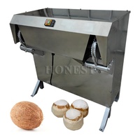 Déchiqueteuse de coque de noix de coco portable à haute efficacité / Machine à coque de noix de coco / Machine à décortiquer la noix de coco automatique