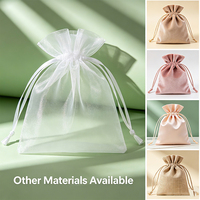 Pochette d'emballage pour bijoux avec logo personnalisé, vente en gros, petit sac en organza transparent avec cordon de serrage, pochettes cadeaux pour mariage, directement de l'usine