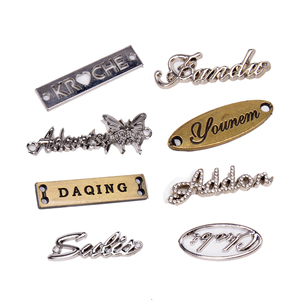 Quần Áo Phụ Kiện Tùy Chỉnh Khắc Thương Hiệu Logo May Kim Loại Nhãn <span class=keywords><strong>Tag</strong></span> Cho Hàng May Mặc/Đồ Bơi Kim Loại Logo Nhãn - Product Image 1