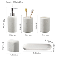 Ensemble d'accessoires de salle de bain CF Modern 5 pièces en résine, style faux travertin, comprenant un plateau de vanité, un pot à cotons-tiges, un porte-brosse à dents et un gobelet pour bain de bouche