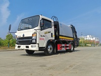 Camion à ordures compacteur Sinotruk Howo de 6 mètres cubes, véhicule de compression des déchets hydraulique léger