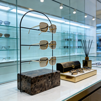 Présentoir à lunettes en marbre sur mesure avec support métallique pour magasin d'optique