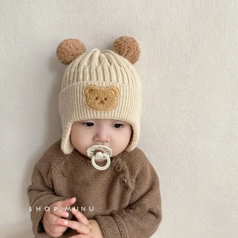 Inverno caldo neonate ragazzi carino pompon cappello protezione dell'orecchio all'aperto lavorato a maglia bambini cappello invernale bambino orso ricamo cappello invernale