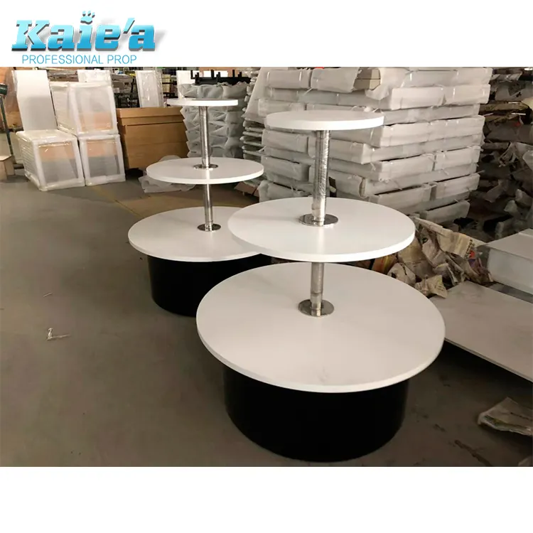 Commerciële wit hout top kledingstukken 3 tiered retail display ronde tafel