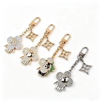 Chaîne de charme pour sac en alliage de zinc, pendentif trèfle étoile fleur, décoration de sac, accessoire vintage, porte-clés, cadeau pour femmes et filles