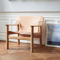 Fauteuil en cuir et bois massif de style nordique de haute qualité pour salon, hôtel, restaurant, chaise de loisirs individuelle, design de créateur
