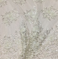 Nouveau tissu en tulle brodé avec des perles à la main, des paillettes et de la dentelle brodée pour les robes de mariée
