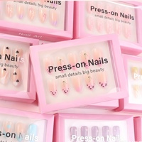 Faux ongles à presser en amande, motif cerise minimaliste, kit d'ongles amovibles style français pour femmes, manucure DIY, vente en gros pour salons