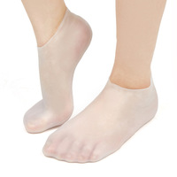 Chaussettes en gel de silicone SEBS réutilisables pour le soin des pieds, hydratantes, blanchissantes, exfoliantes, anti-fissures et antidérapantes