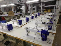 Machine à coudre industrielle à point droit simple aiguille JUKI DDL-7000A-7 d'occasion, ensemble complet